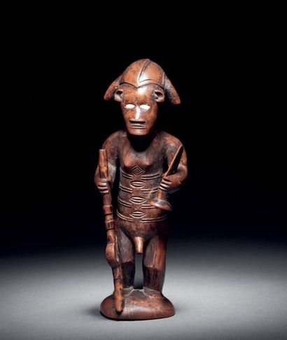  Bembe figure, Democratic Republic of the Congo Wood with brown patina, porcelain...