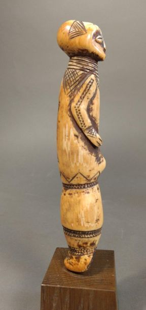null * Figurine anthropomorphe iginga, Léga,
République Démocratique du Congo
Epoque...