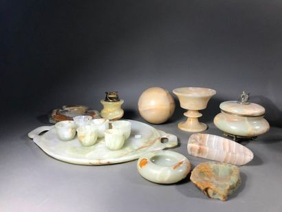 null Hard stone and jade set including:
A tray, six cups, a lighter, four ashtrays,...