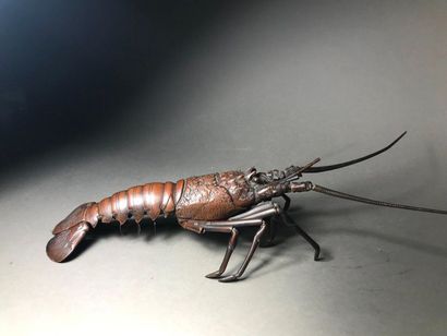 JAPON - Epoque MEIJI (1868 - 1912) 
Bronze okimono with brown patina, fully articulated...