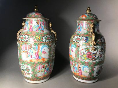 null Pair of covered vases
Canton porcelain with scenes of palaces in storerooms...