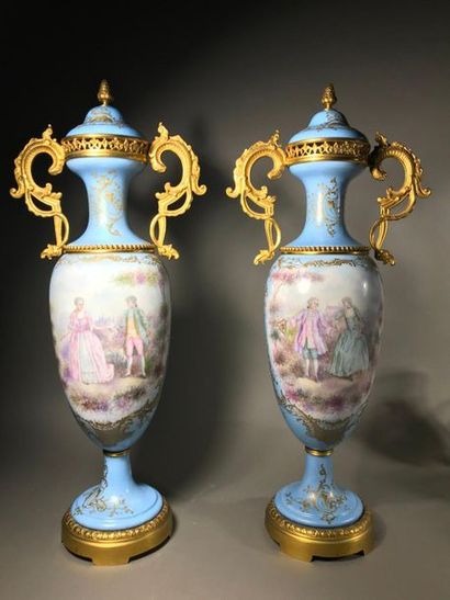 null Pair of baluster vases
Porcelain, polychrome decoration of gallant couples in...