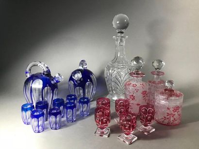 null Set of glassware including: 2 crystal bottles and 8 glasses with 5 small red...
