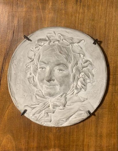 D'après Jean-Baptiste CARPEAUX (1827-1875) 
PORTRAIT OF MADAME DEFLY Plaster medallion
Signed,...