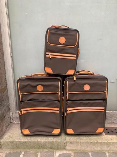 LANCEL PARIS 
Set of 3 wheeled suitcases