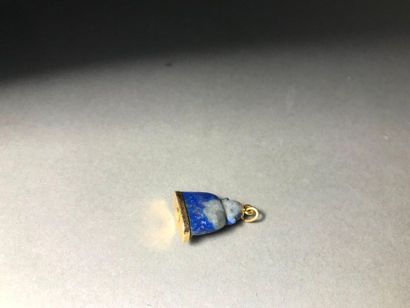 null Blue stone Buddha mounted in gold 

PB: 3.77 g