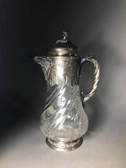 null Glass ewer with twisted rib decoration, 950° silver mount

E.B. punch with a...
