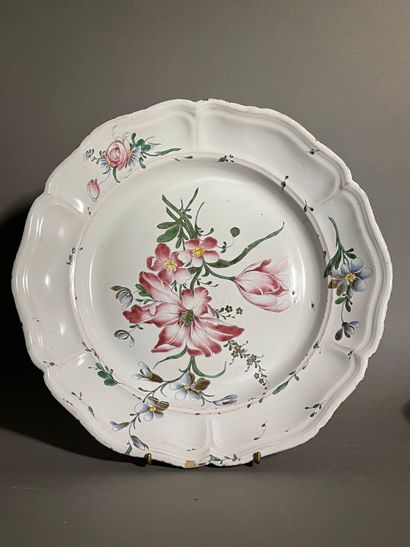 STRASBOURG 
Two round earthenware dishes with polychrome decoration of bouquets of...