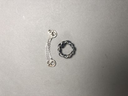 null Lot including a 925°/°° silver bracelet with a link between tissue and a 750°/°°...