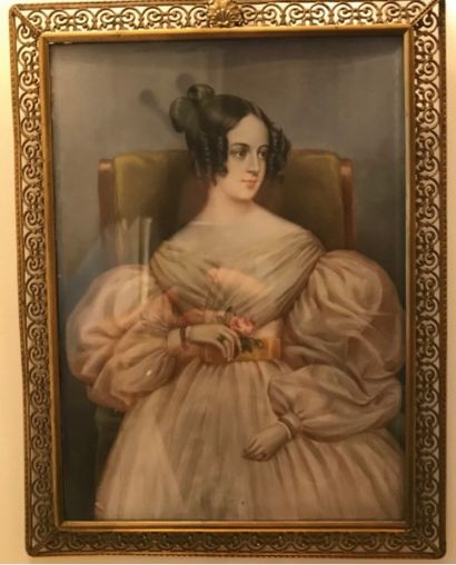 ECOLE FRANCAISE DU XIXème siècle 
Portrait de femme à la rose
Miniature
21x15 cm...