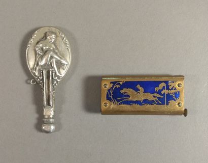 null Lot including : 

- a rare engraved brass and blue enamel matchbox decorated...