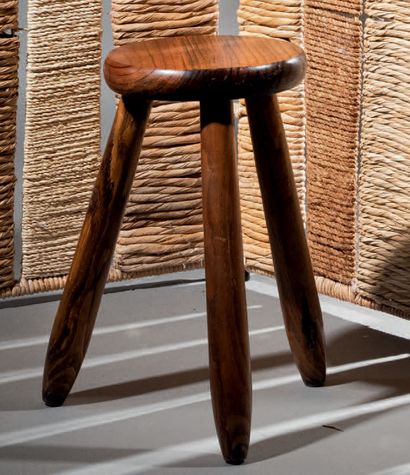 TRAVAIL FRANÇAIS Two varnished wood stools, one tripod with a circular seat and the...