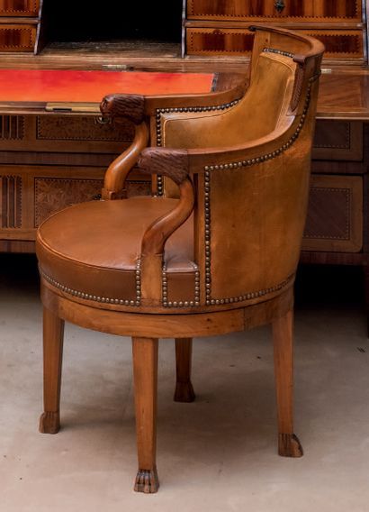 null Mahogany and veneer cabinet armchair, with swivel seat.
Axial sheathed base,...