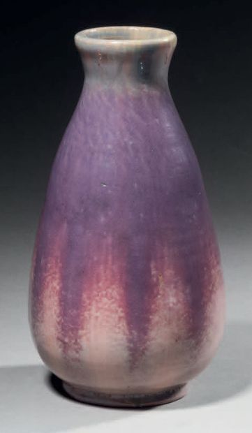 ELCHINGER & CIE A stoneware vase with an ovoid body and conical neck. Pink and purple...