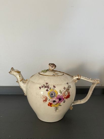 MEISSEN A porcelain covered teapot with wickerwork motifs in slight relief and polychrome...