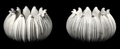 null A pair of large grey veined white marble basins in the form of a flower bud.
H....