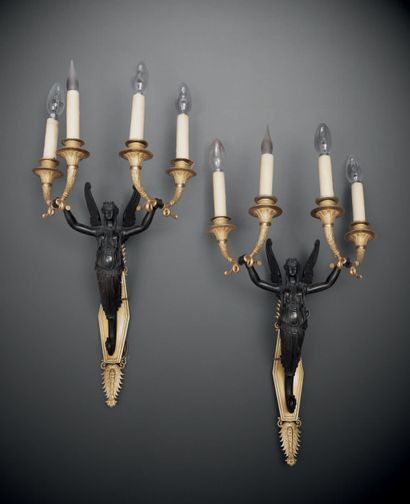 null Pair of large four-light sconces in chased, gilt or patinated bronze; the hexagonal...
