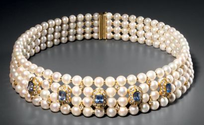 null 
Necklace in 750 °/°°° gold with four rows of cultured pearls punctuated with...