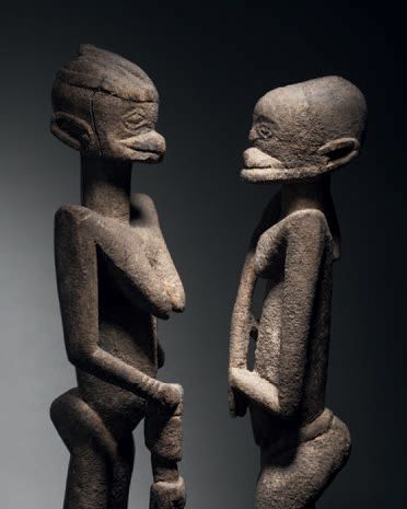 null Ɵ Tellem pair of standing figures, Dogon, Mali 1335-1455
Wood with slightly...