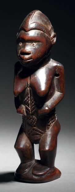 null Statuette, Bembe, Democratic Republic of the Congo
Wood with brown patina
H....