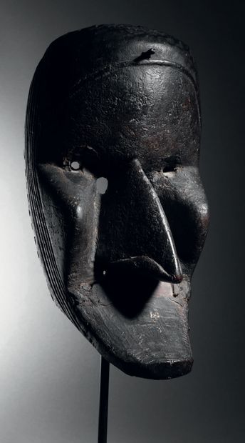 Dan Poro mask, Ivory Coast Wood with black...