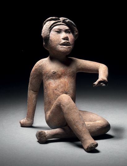 null FIGURINE ASSISE Culture Xochipala, État de Guerrero, Mexique
Préclassique moyen,...