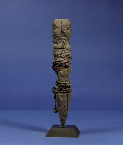 null 
Small wooden botchio pole representing two monoxyletic back to back figures...
