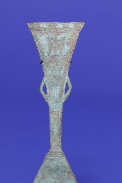  Finely worked spoon, the handle decorated with geometrical patterns. Bronze with...