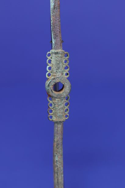  Double spoon, a spherical spoon at each end, the handle decorated in its center...