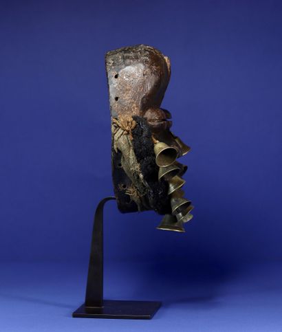  Beautiful singing mask adorned with a beard made of woven human hair and bronze...
