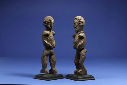  Pair of statuettes of divination or protection,...