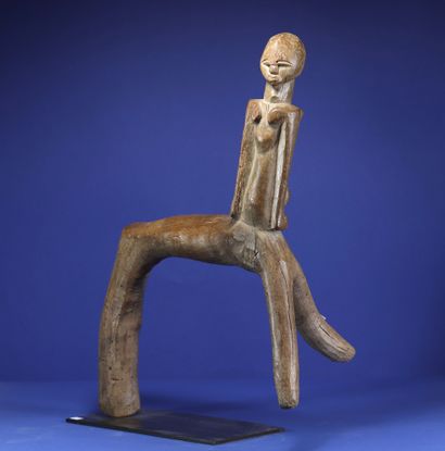  Amazing tripod stool from which emerges the torso of a character. Wood with honey...