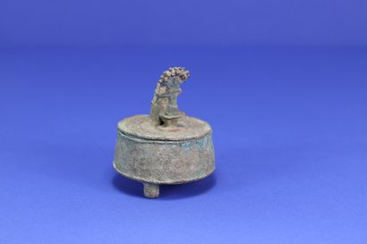 null 
Kuduo gold powder box, the lid decorated with a drummer. 



Bronze with green...