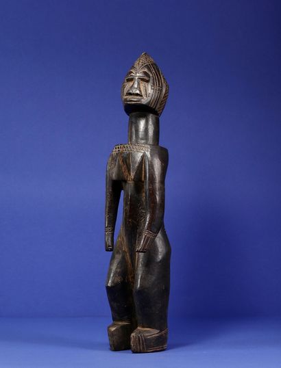 null 
Statue representing a standing female figure, the shoulders and chest projected...