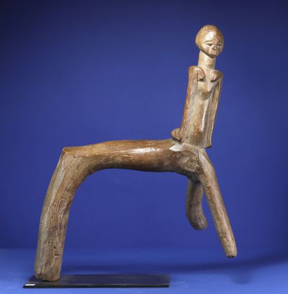 null 
Amazing tripod stool from which emerges the torso of a character. 

Wood with...