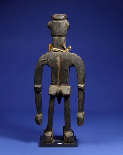 null 
Male statue with a vigorous style, the disproportionately long arms detached...