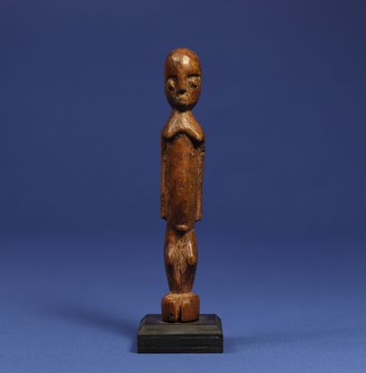  Charming Janus statuette. Wood with honey patina. Lobi, Burkina Faso. H. 14,5 cm....