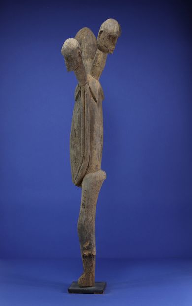 null 
Rare and imposing statue depicting a three-headed body, the arms glued to the...