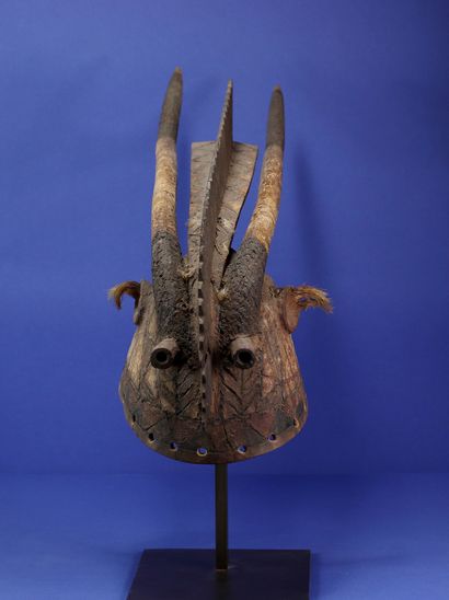 null 
Helmet mask representing a supernatural animal, tubular eyes, two long horns...