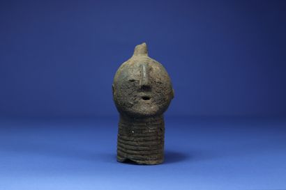  Funerary head with ringed neck. Terracotta....