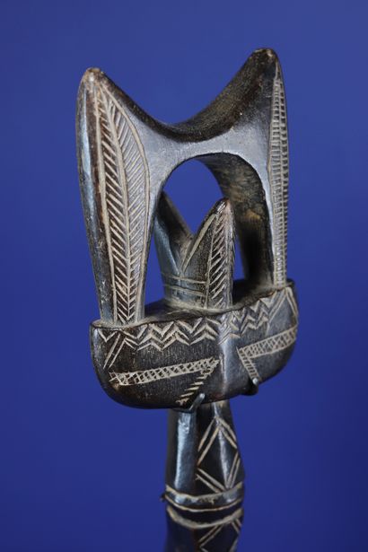 null 
Wakemia spoon, the handle decorated with geometrical patterns. 



Wood with...