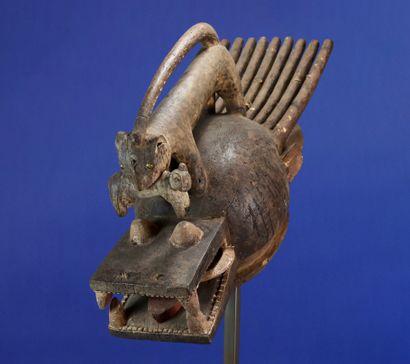 null 
Important bonu amuin helmet-mask combining the features of various animals,...