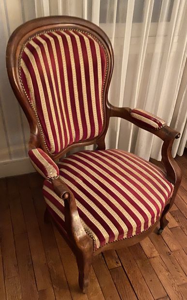 null Mahogany Voltaire type armchair.
Late 19th century.