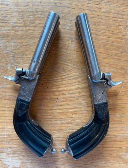 null Pair of double percussion pistols.
The engraved plates
The carved stock
Small...