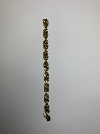 null 
Gold bracelet 585°/°° with twisted and chiselled links, L 19cm, Weight: 16...
