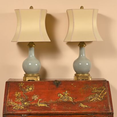 null A pair of celadon porcelain vases with chased and gilt bronze mountings, the...