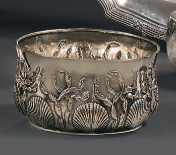  Silver lot 825 and 950 thousandths comprising: - a round cup decorated in repoussé...