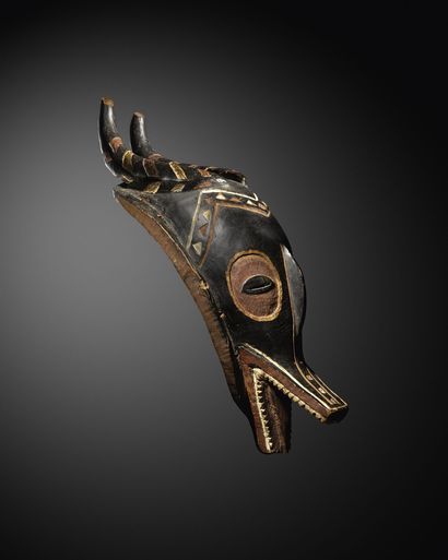 null Guro Zamble mask, Republic of Côte d'Ivoire 
Wood with black patina and ochre...