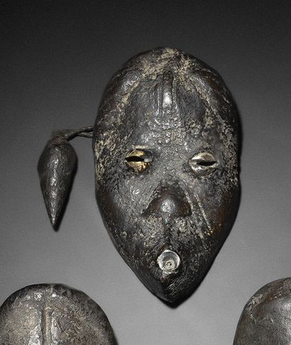  Miniature Dan mask, Republic of Ivory Coast Wood, slightly crusty black patina,...