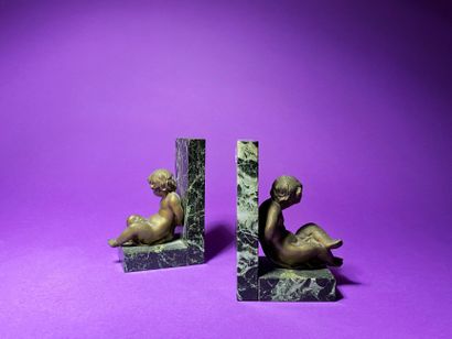 null French work from the first half of the 20th century Chained putti Pair of bookends...